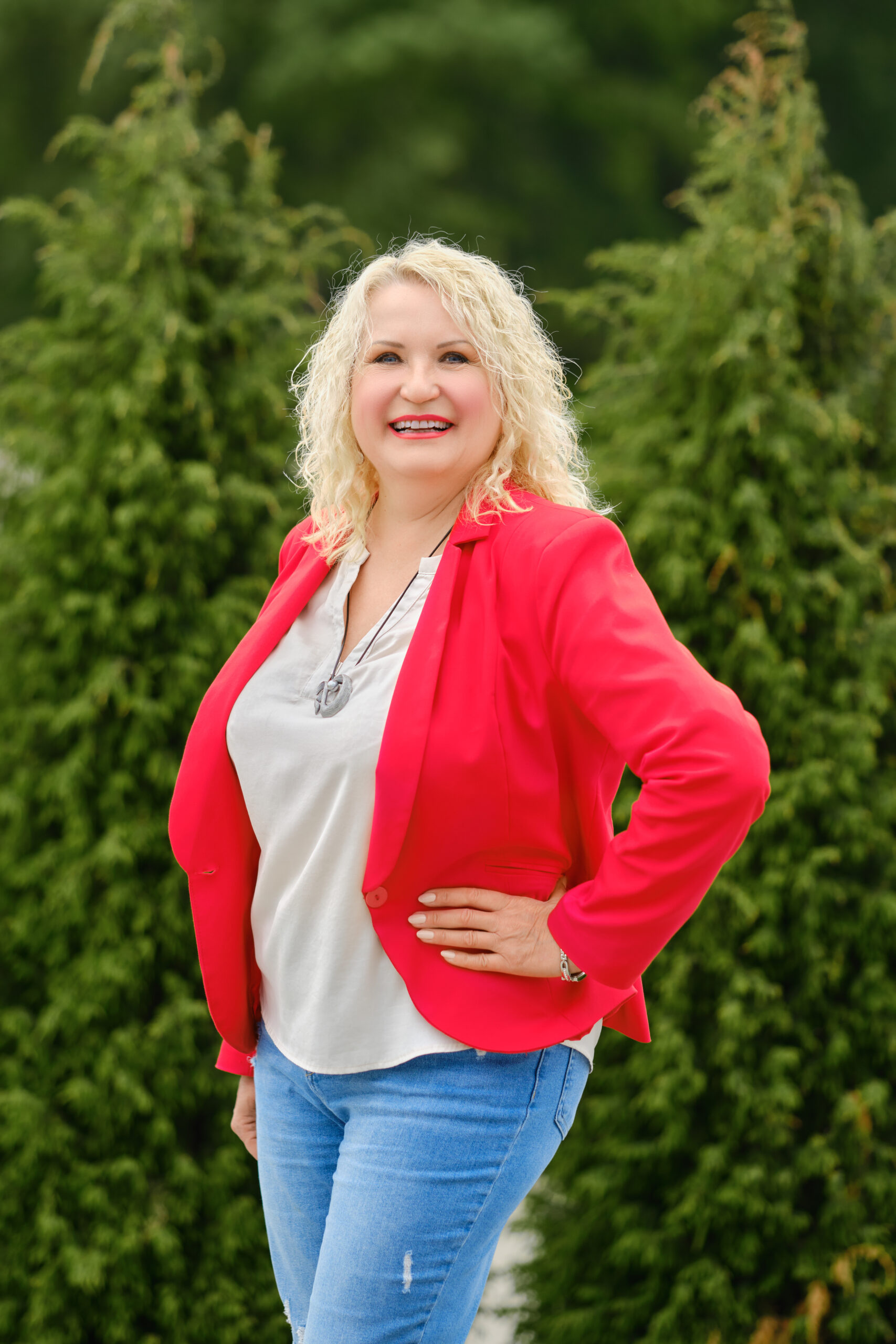 Portrait of middle-aged woman outdoors - weightloss success